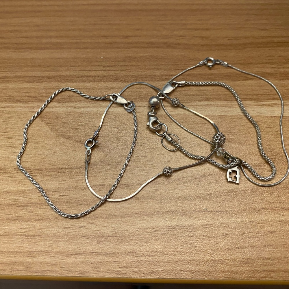 Four simple vintage, 925 Sterling silver bracelets, some marked Italy